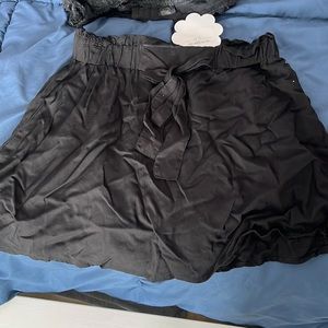 Black ruffle skirt